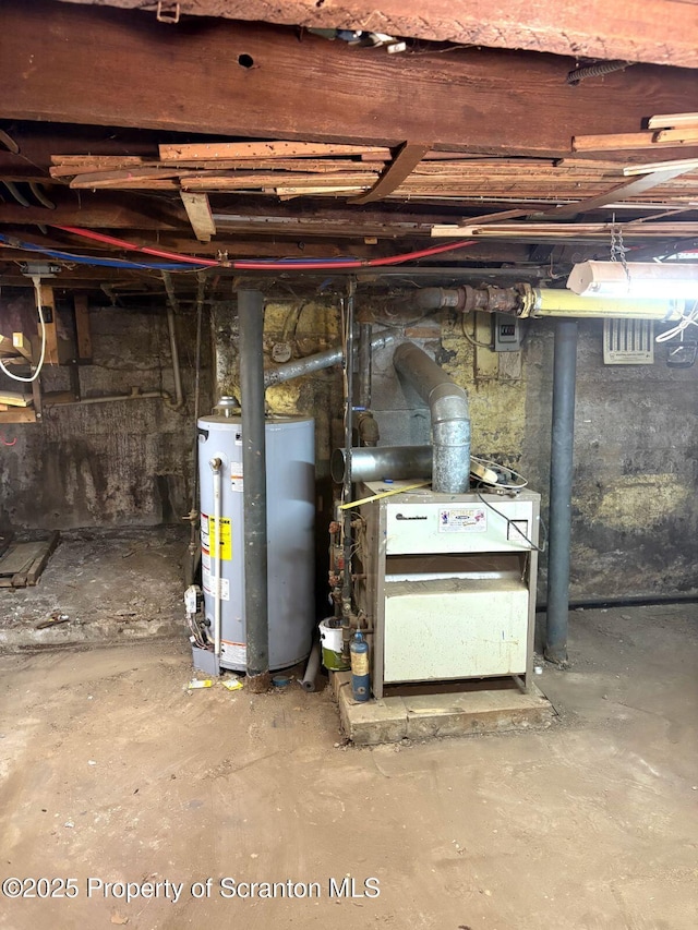 unfinished basement featuring gas water heater