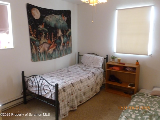 bedroom featuring a baseboard radiator