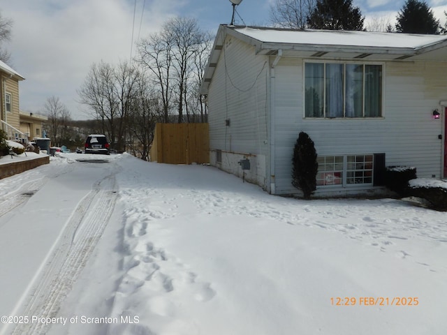 view of snow covered property