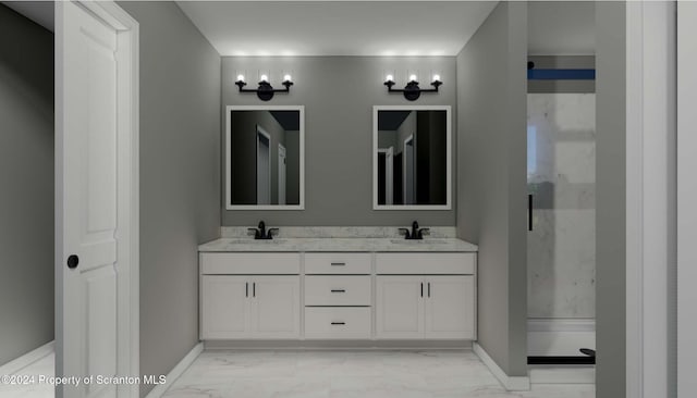 bathroom featuring a shower and vanity