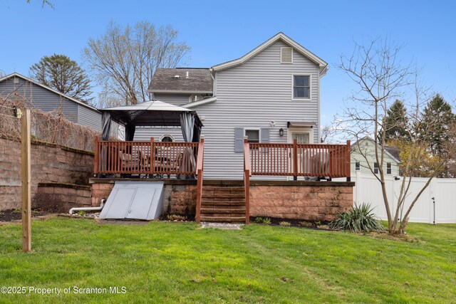 217 N Everett Ave, Scranton, PA 18504 - back of house featuring a shingled roof, a gazebo, a lawn, fence, and a wooden deck