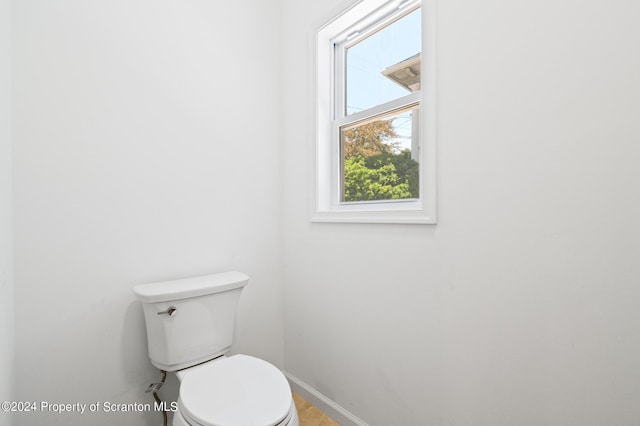 bathroom featuring toilet