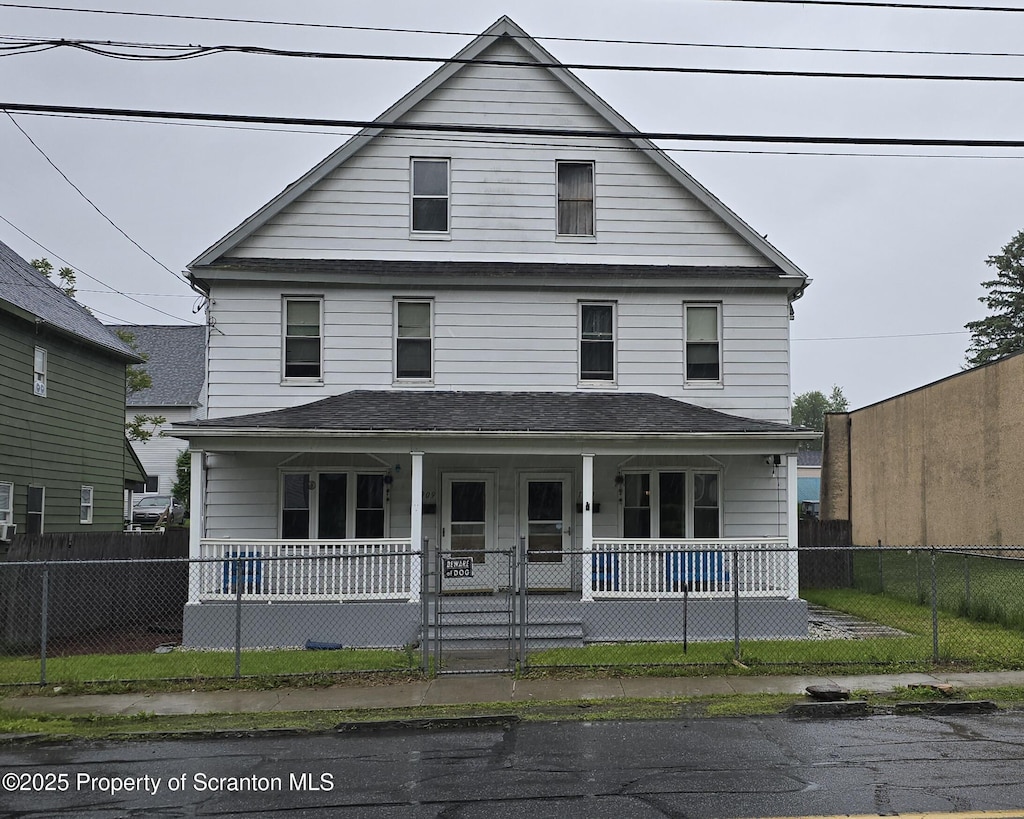 1909-1911 Luzerne St, Scranton, PA 18504 - view of front of property featuring covered porch and a fenced front yard