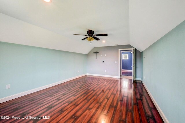 bonus room with hardwood / wood-style floors, ceiling fan, and vaulted ceiling