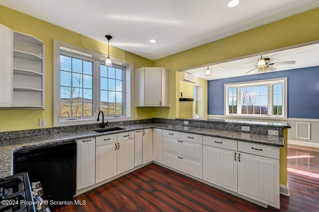 kitchen with white cabinetry, dishwasher, pendant lighting, and sink