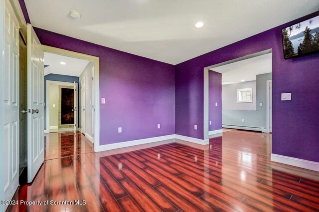 spare room with a baseboard radiator