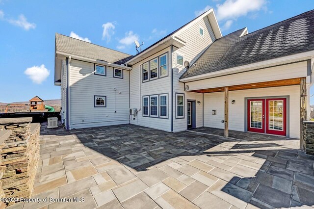 rear view of house with a patio