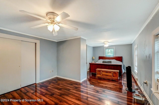 bedroom featuring a closet, ceiling fan, crown molding, and dark hardwood / wood-style floors