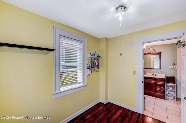 entryway featuring hardwood / wood-style floors and sink