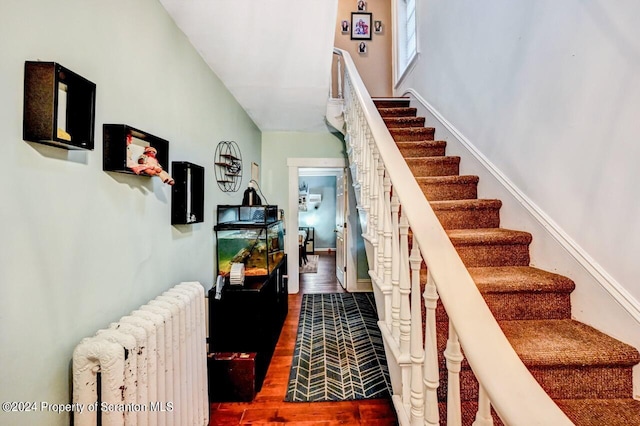 stairs featuring radiator