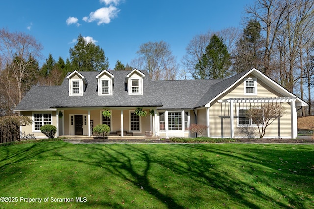 new england style home featuring a porch, a front lawn, and a pergola