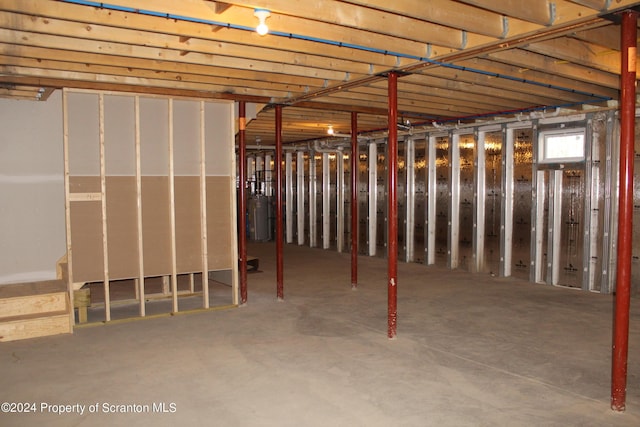 basement featuring gas water heater