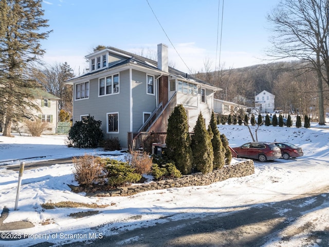 view of snow covered property