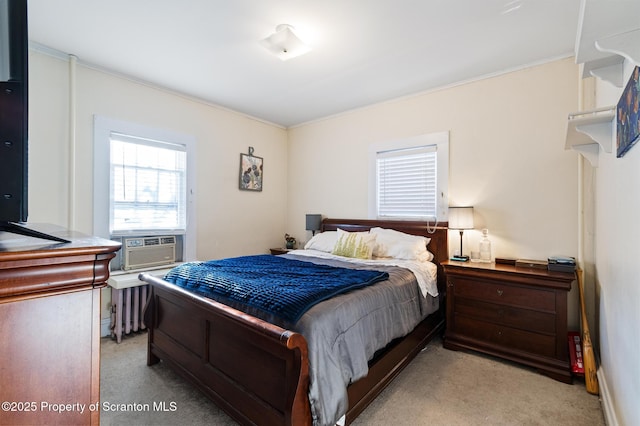 bedroom featuring light colored carpet and cooling unit