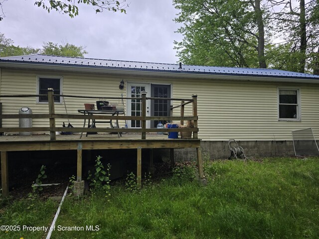 1563 Black Birch Way, Tobyhanna, PA 18466 - rear view of house featuring a deck and metal roof