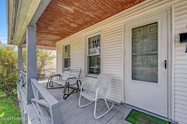 view of patio featuring a porch