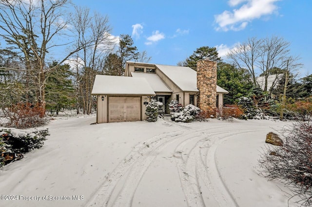 front of property with a garage