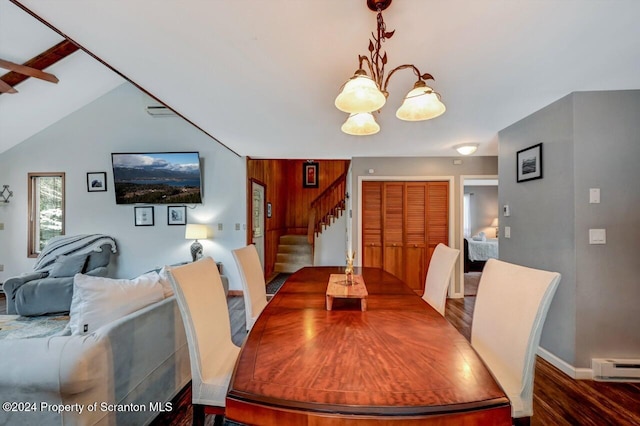 dining area featuring a chandelier, dark hardwood / wood-style floors, and baseboard heating