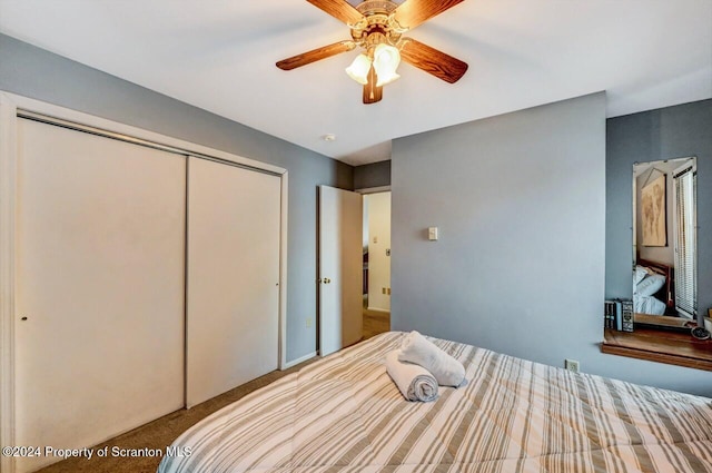 bedroom featuring carpet flooring, a closet, and ceiling fan