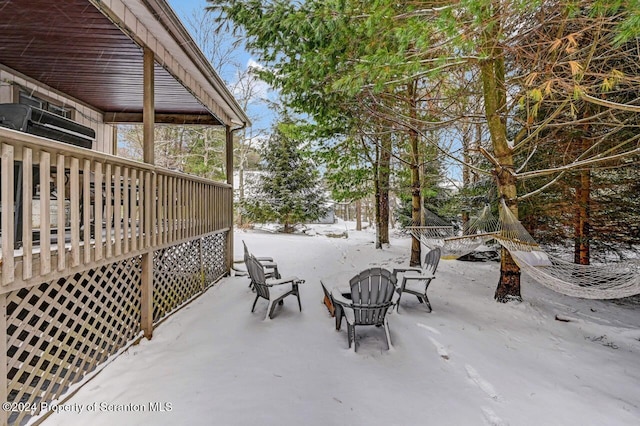 view of snow covered patio