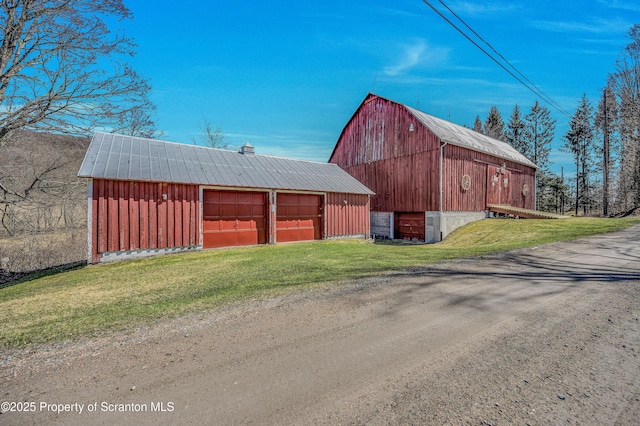 815 Svecz Rd, Union Dale, PA 18470 - view of barn featuring driveway and a lawn