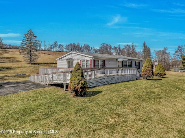 815 Svecz Rd, Union Dale, PA 18470 - back of property featuring a wooden deck and a lawn