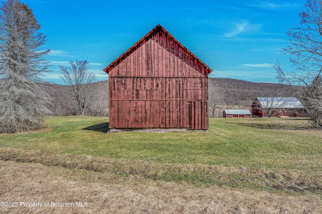 815 Svecz Rd, Union Dale, PA 18470 - view of barn with a yard