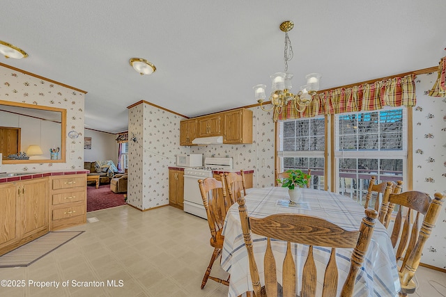 815 Svecz Rd, Union Dale, PA 18470 - dining space with ornamental molding, an inviting chandelier, light floors, and wallpapered walls