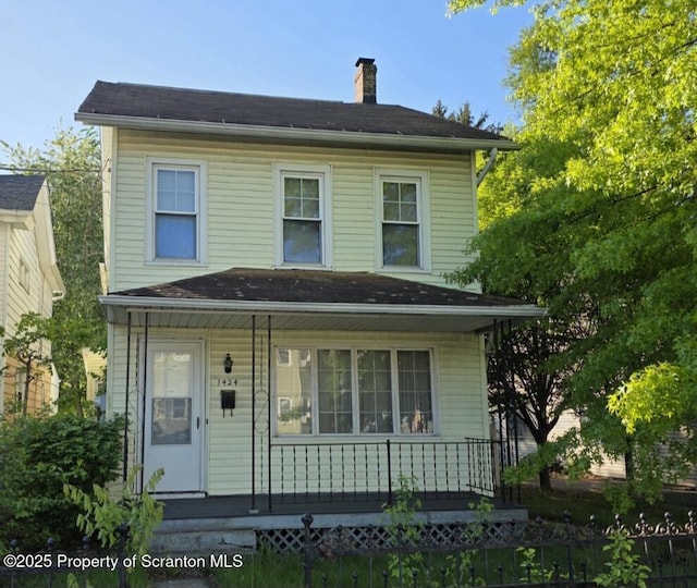 1424 Capouse Ave Unit L6, Scranton, PA 18509 - view of front of property featuring covered porch and a chimney