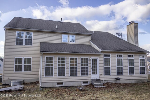 view of property exterior with a yard