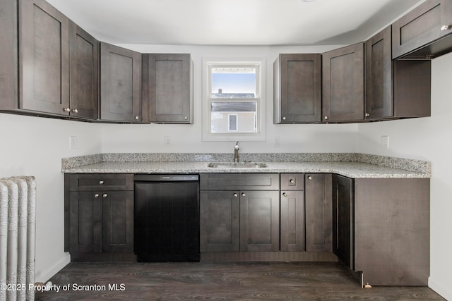 kitchen with light stone countertops, sink, dark wood-type flooring, black dishwasher, and dark brown cabinets