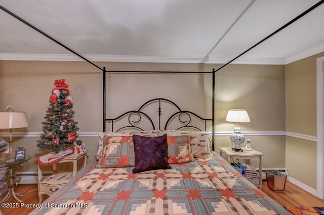 7 Lakeside Dr, Clarks Summit, PA 18411 - bedroom featuring crown molding, baseboards, and wood finished floors