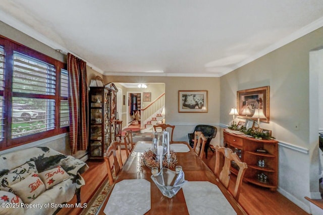7 Lakeside Dr, Clarks Summit, PA 18411 - dining space with stairs, crown molding, and wood finished floors