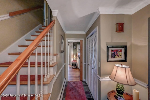 7 Lakeside Dr, Clarks Summit, PA 18411 - stairway featuring crown molding and a baseboard heating unit