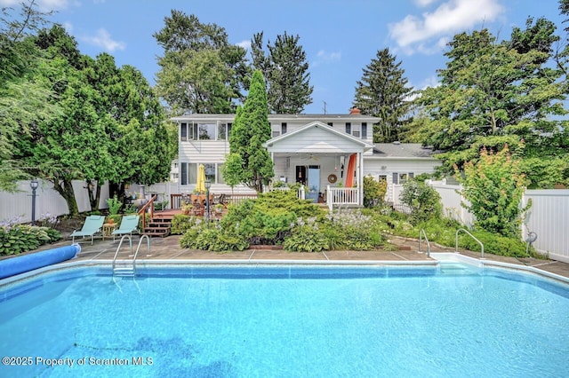 7 Lakeside Dr, Clarks Summit, PA 18411 - view of pool featuring a wooden deck and a fenced backyard