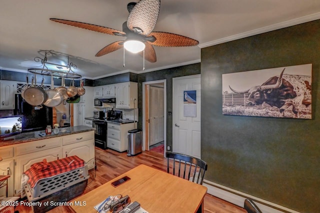 7 Lakeside Dr, Clarks Summit, PA 18411 - dining area with ornamental molding, light wood-style floors, a baseboard radiator, and ceiling fan