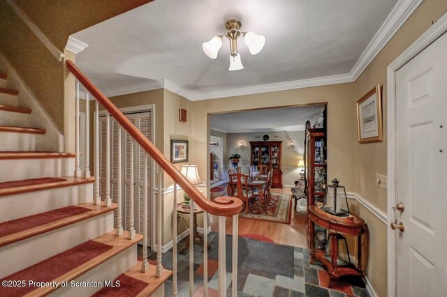 7 Lakeside Dr, Clarks Summit, PA 18411 - foyer entrance with stairway, crown molding, and wood finished floors