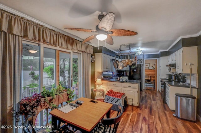 7 Lakeside Dr, Clarks Summit, PA 18411 - dining room with ceiling fan, dark wood-type flooring, and crown molding