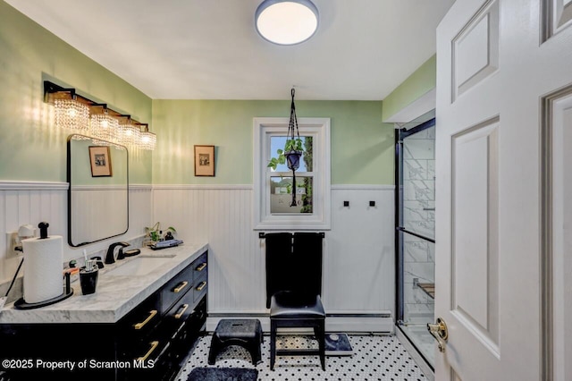 7 Lakeside Dr, Clarks Summit, PA 18411 - full bath featuring a shower stall, wainscoting, vanity, and a baseboard radiator