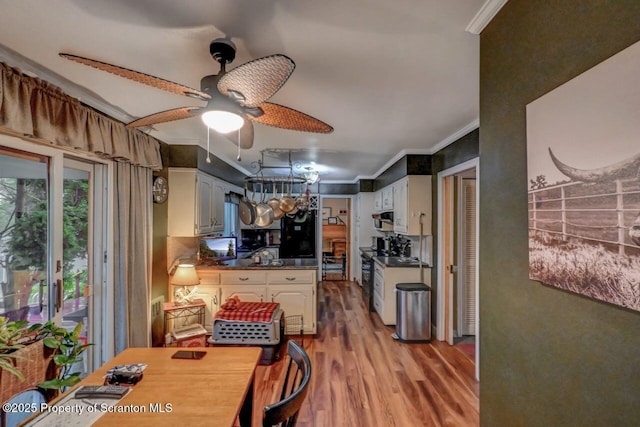 7 Lakeside Dr, Clarks Summit, PA 18411 - kitchen featuring ornamental molding, light wood-style floors, a ceiling fan, black range with electric cooktop, and dark countertops
