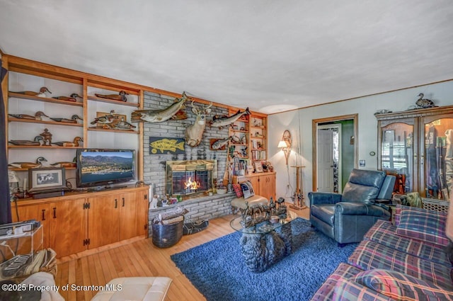 7 Lakeside Dr, Clarks Summit, PA 18411 - living room with hardwood / wood-style floors and a fireplace