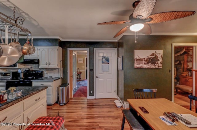 7 Lakeside Dr, Clarks Summit, PA 18411 - kitchen featuring light wood-style flooring, ceiling fan, crown molding, dark countertops, and white cabinets