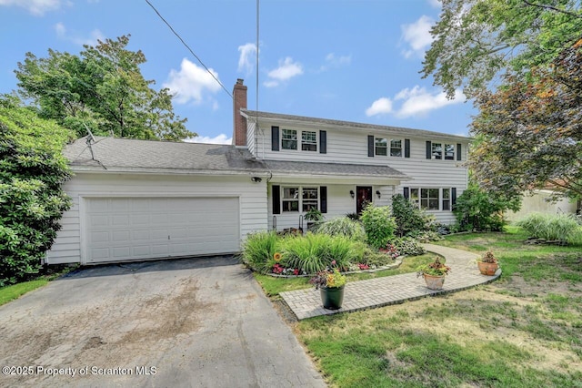 7 Lakeside Dr, Clarks Summit, PA 18411 - traditional-style house with asphalt driveway, a garage, a chimney, and a front lawn