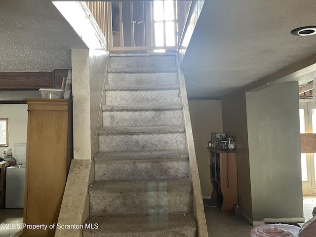 stairs with a wealth of natural light