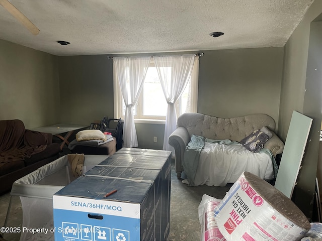 living room with a textured ceiling