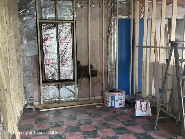 miscellaneous room with tile patterned floors