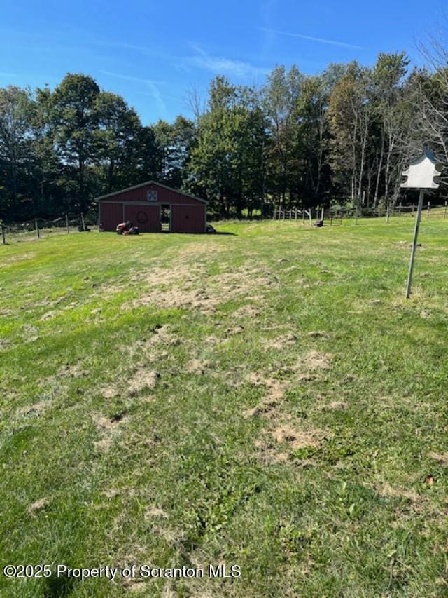 445 Bush Rd, Montrose, PA 18801 - view of green lawn featuring a pole building and an outbuilding