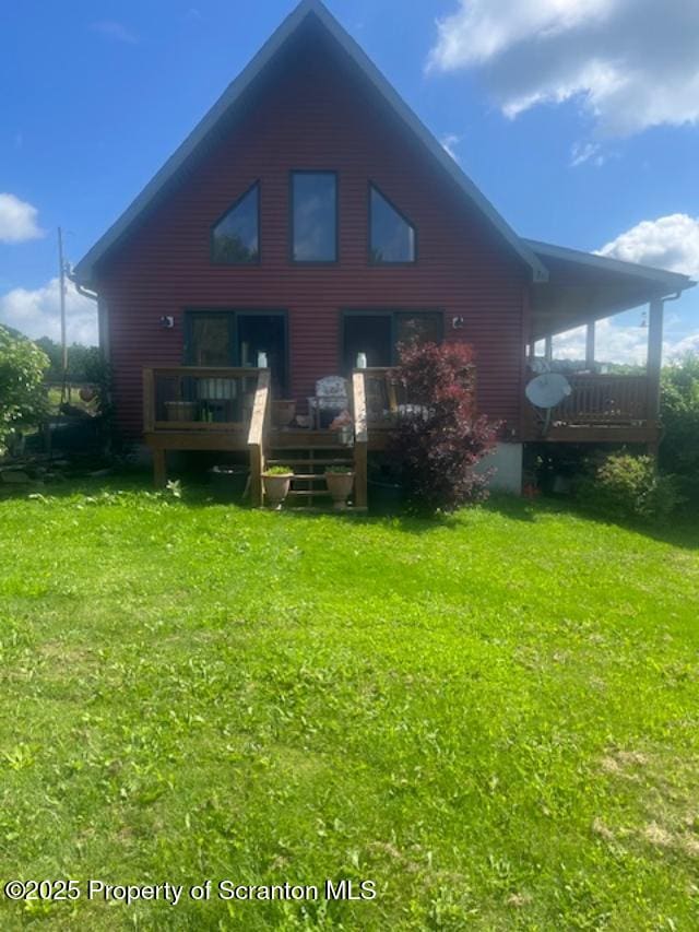 445 Bush Rd, Montrose, PA 18801 - back of property featuring a deck and a yard