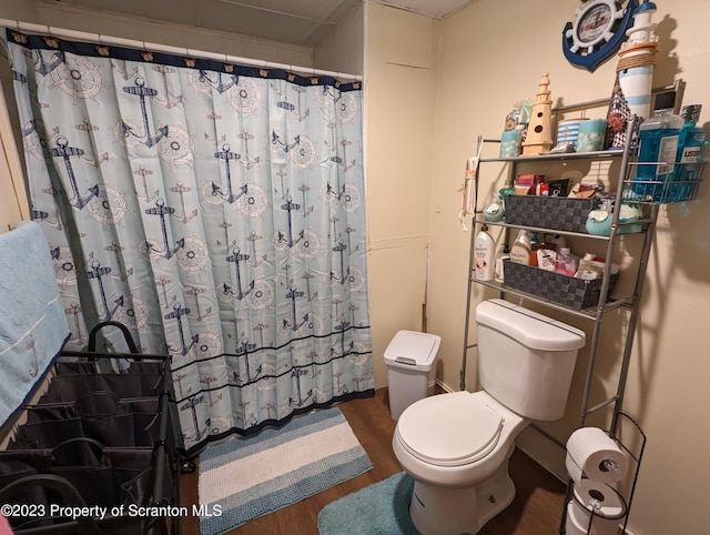 121 Sand St, Dunmore, PA 18510 - full bath with wood finished floors and curtained shower