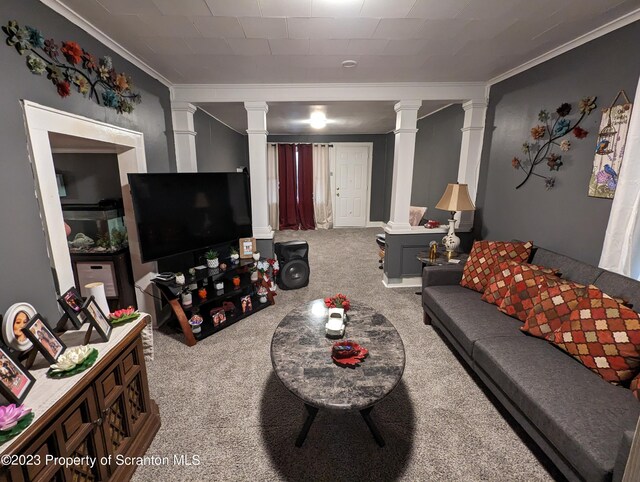 121 Sand St, Dunmore, PA 18510 - living area with decorative columns, carpet floors, and ornamental molding
